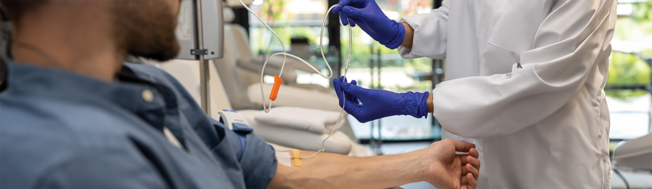 Male patient receiving IV in arm