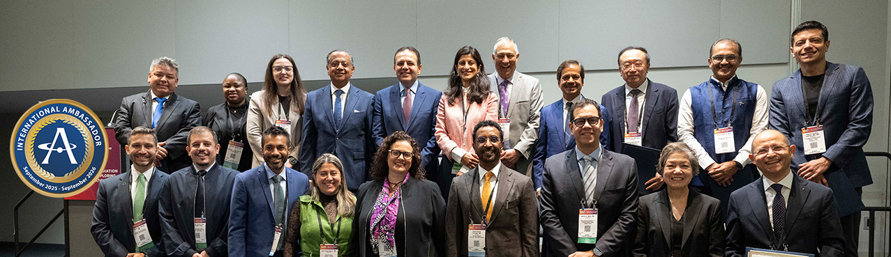 Ambassadors standing together with logo