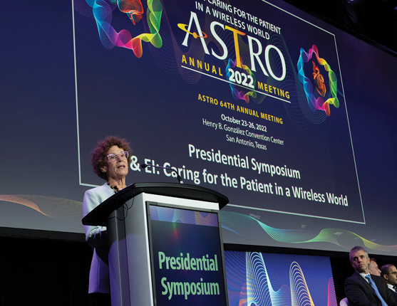 Image: ASTRO Chair Geraldine Jacobson on stage presenting at ASTRO 2022 Annual Meeting.