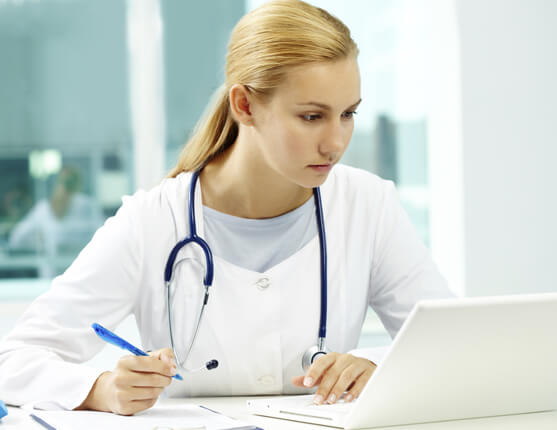 Image: Docotor on a computer