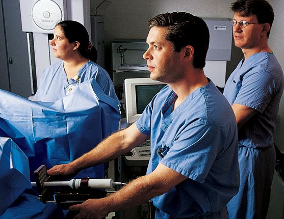 Image: group of doctors delivering brachytherapy