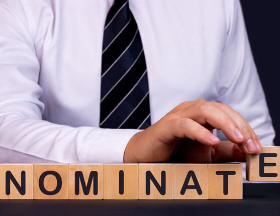 Image: Scrabble letters spelling out nominate