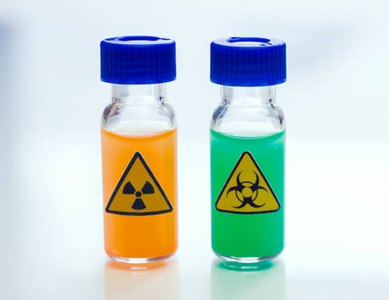Image: Two medical vials with radiation warning labels