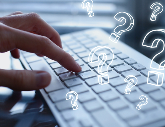 Image: Keyboard with floating question marks