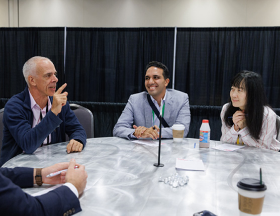 Image: Doctors sitting around table at mentoring session