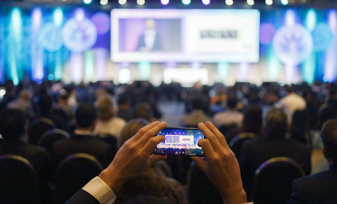 Image: Attendees sitting in a session room at meeting
