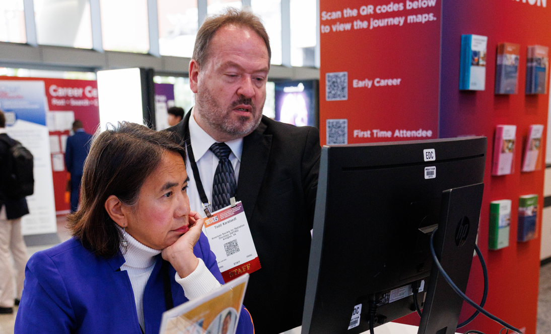 Image: ASTRO staff helping Annual Meeting Attendee